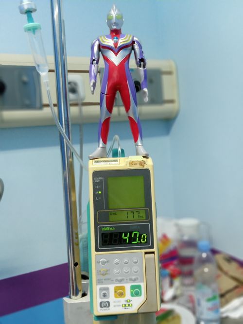 Free Ultraman guards the infusion pump Stock Photo