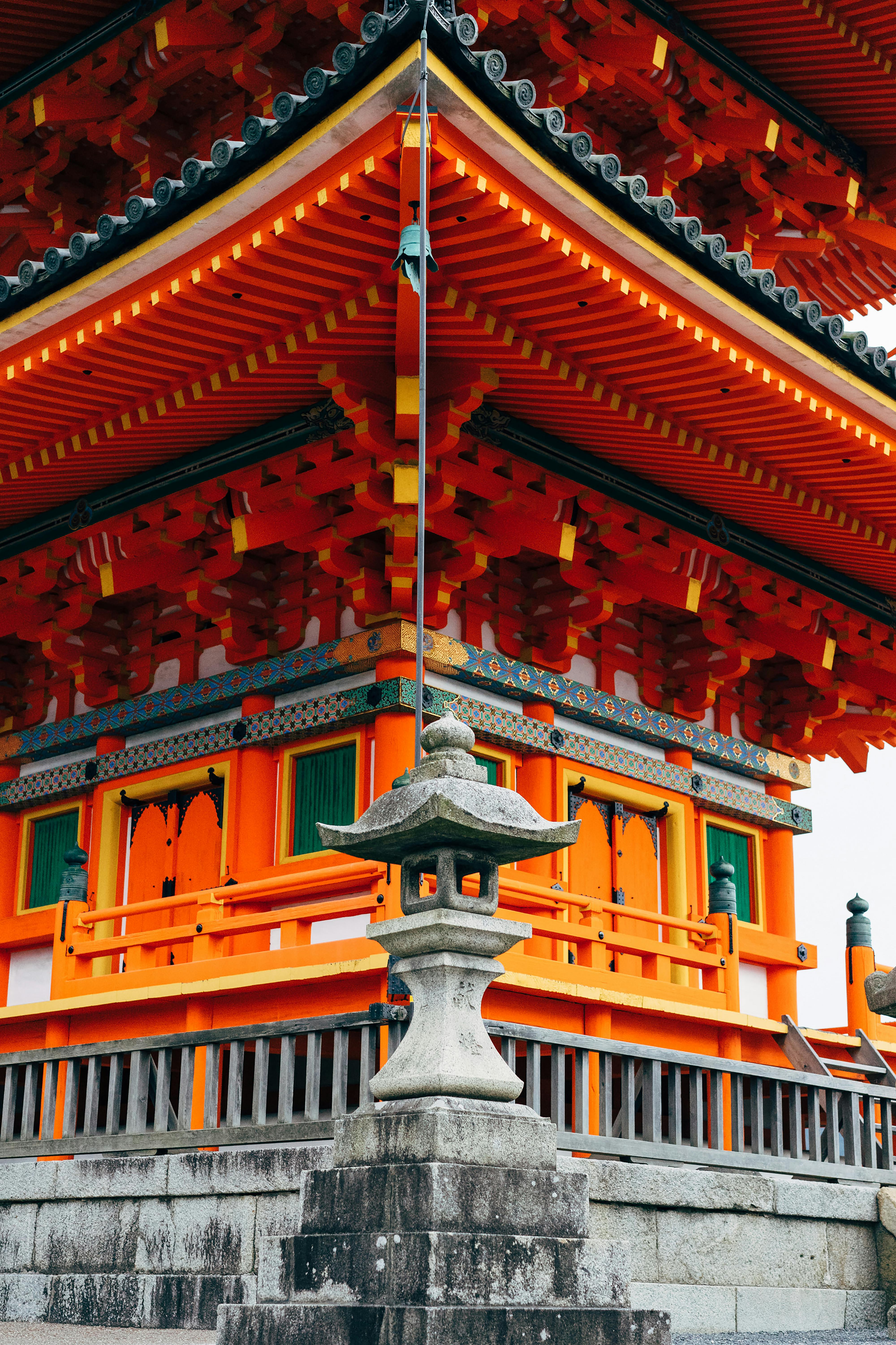 a pagoda with orange and green decorations