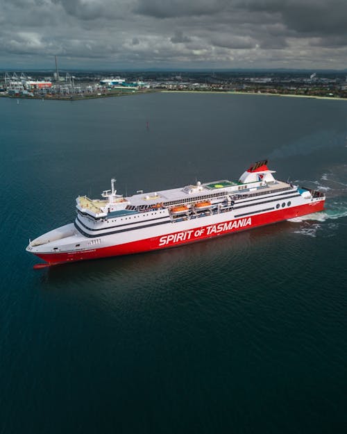 White and Red Spirit of Tasmania Cruise Ship on Body of Water