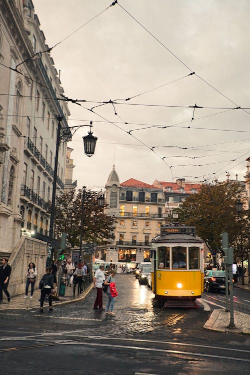 Free Yellow Tram in City Street Stock Photo