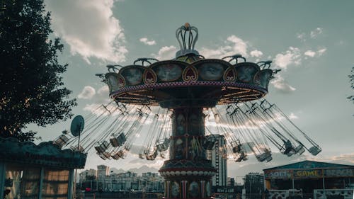 Carousel in an Amusement Park at Sunset 