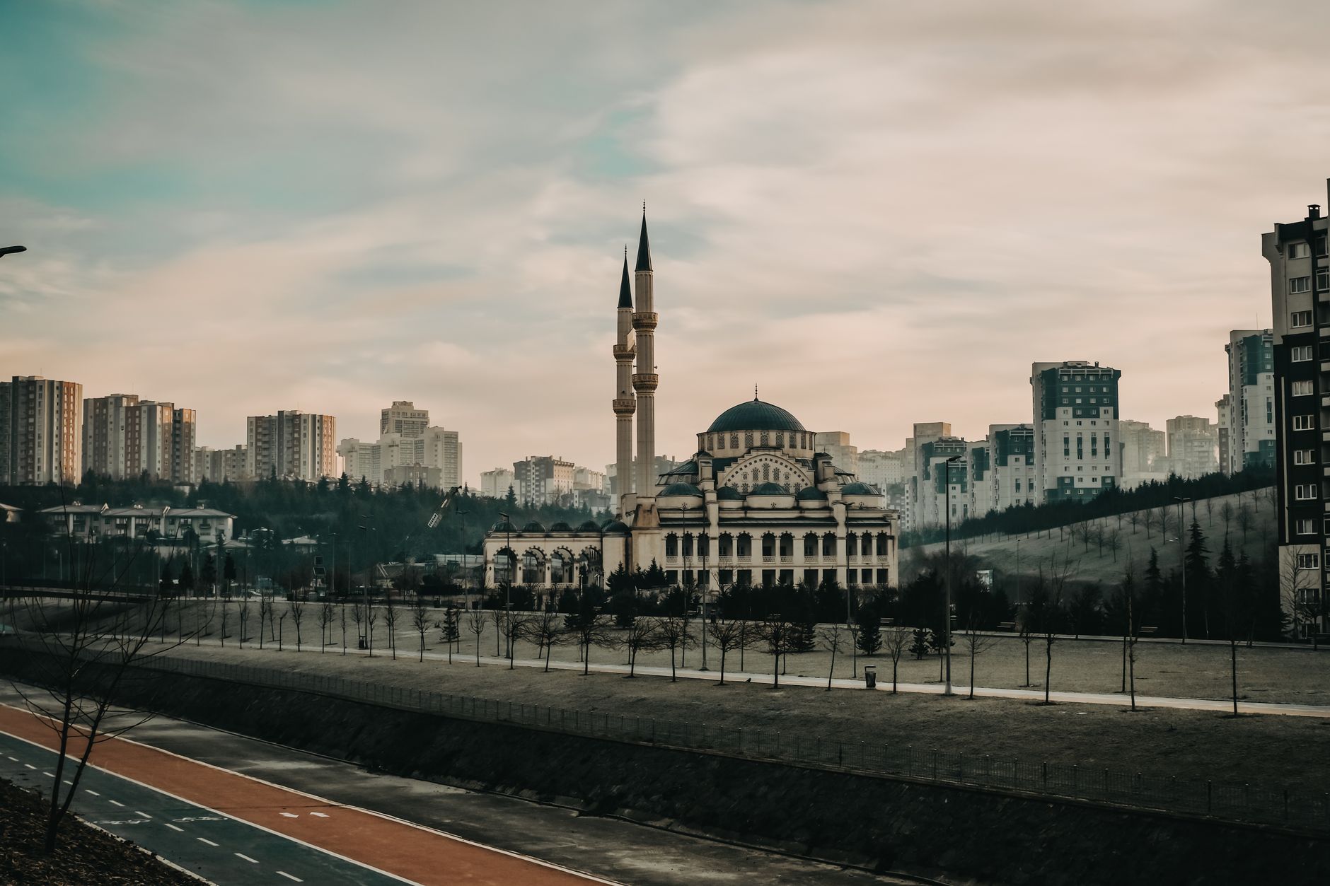 Scenic view of a mosque and minarets in Istanbul's cityscape.