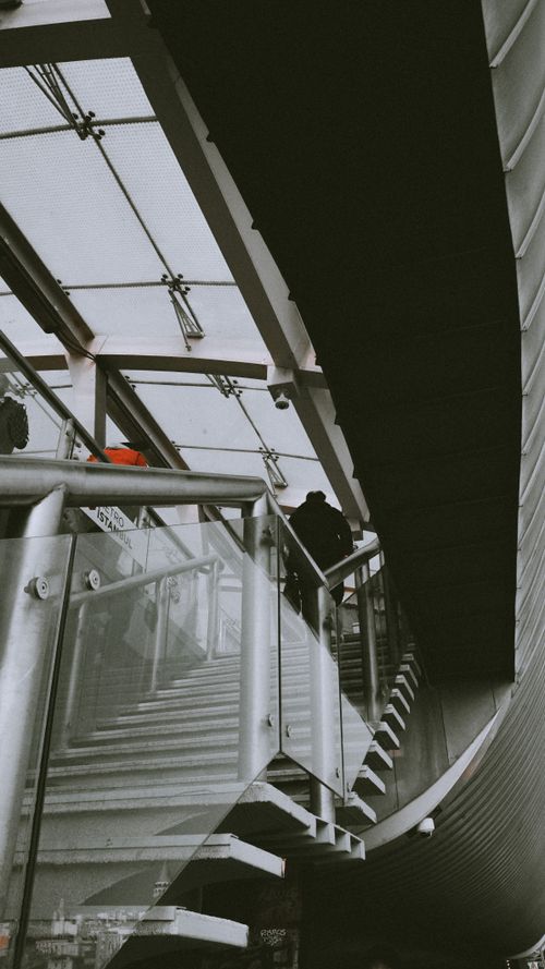 Free A modern glass staircase ascending in an urban area, showcasing architectural design in Istanbul, Turkey. Stock Photo