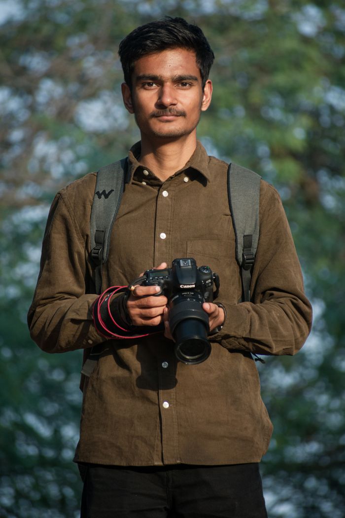 Indian photographer with a camera