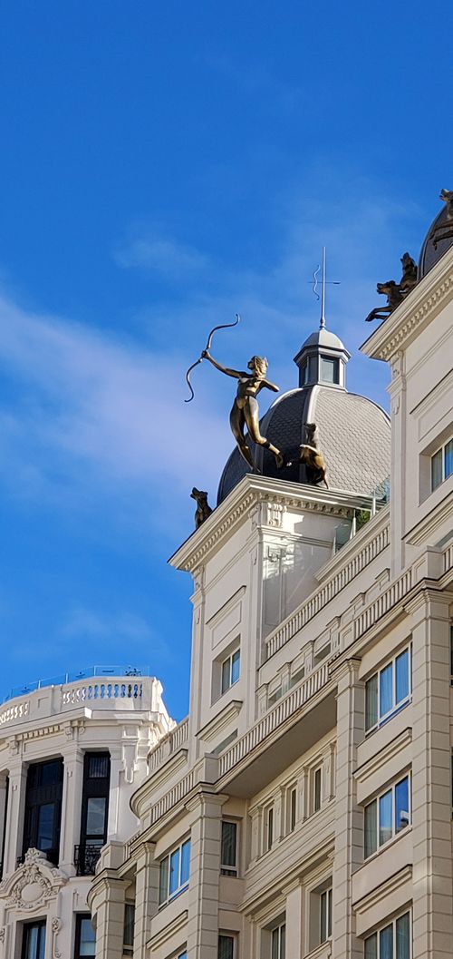 Free Building top on Gran Via in Madrid Spain Stock Photo