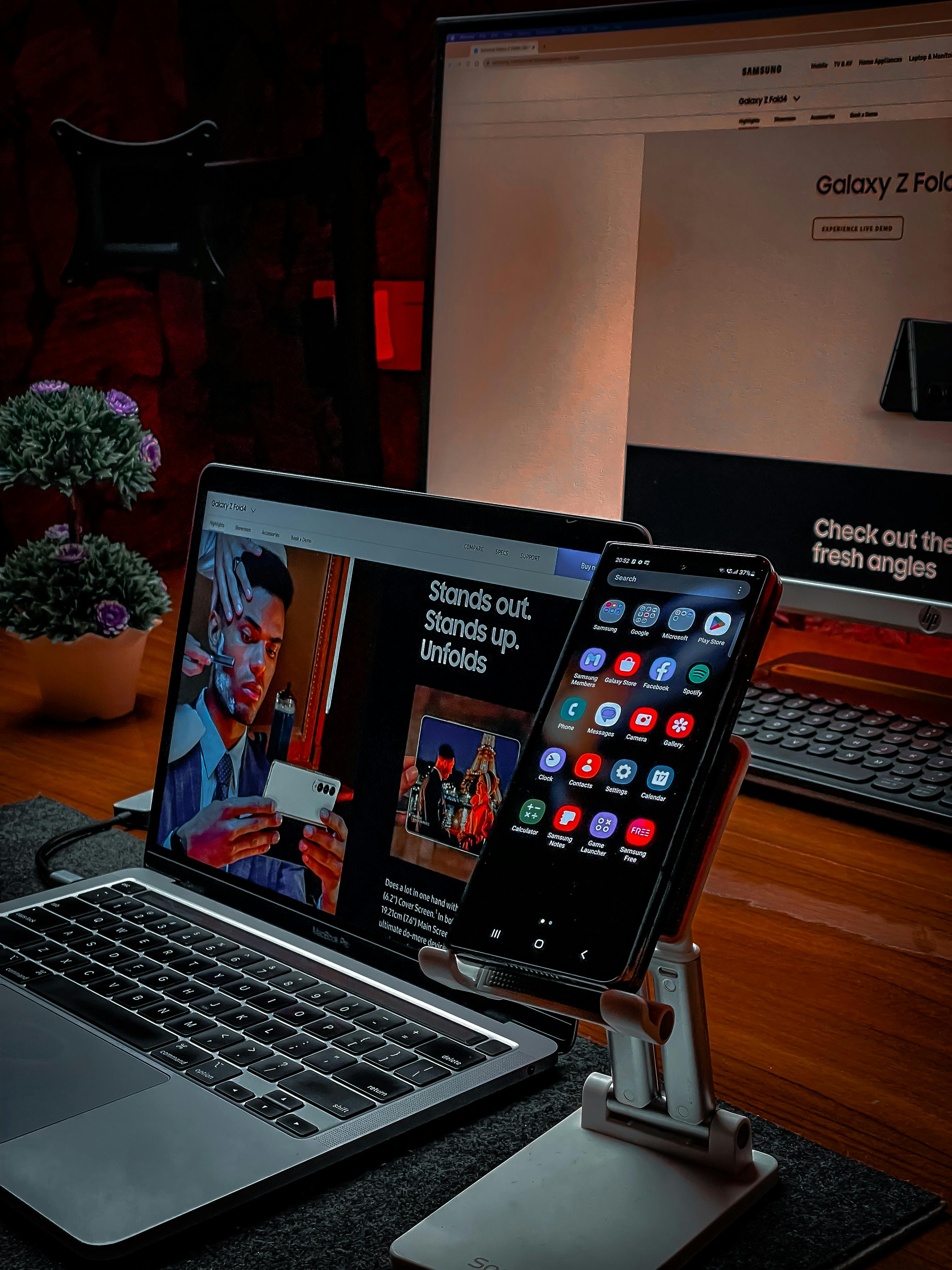 Macbook Pro Beside Clear Glass Jar · Free Stock Photo