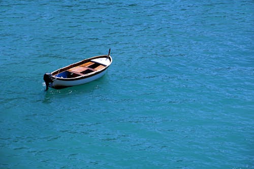 deniz, deniz aracı, kano içeren Ücretsiz stok fotoğraf