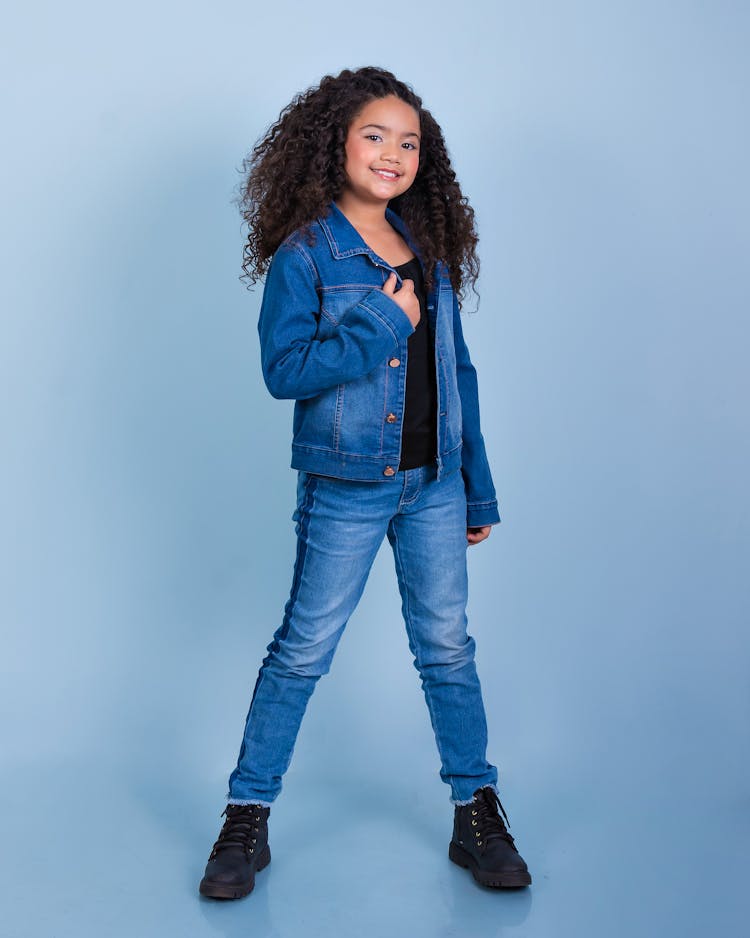 Girl Posing In Jeans And Jacket