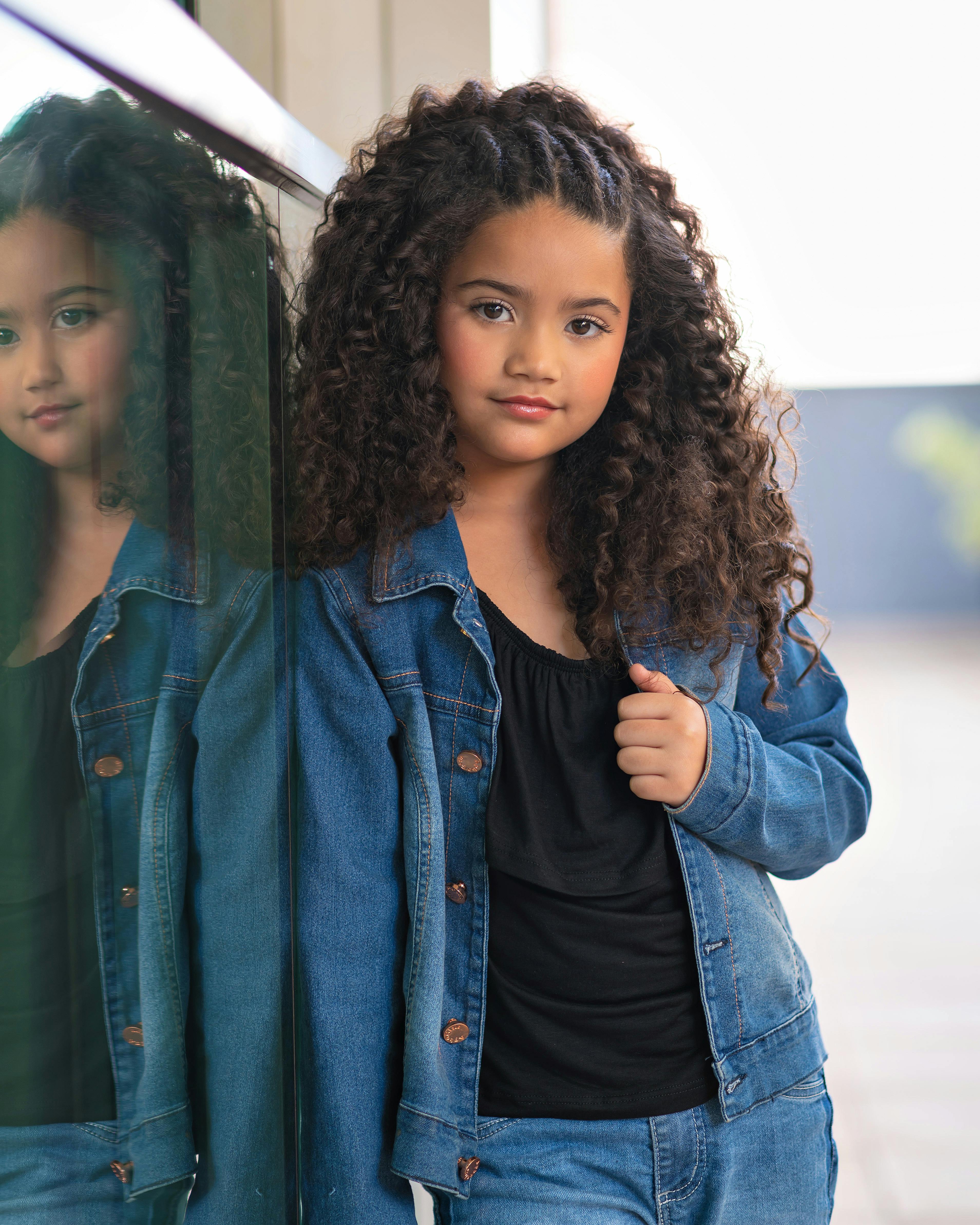 Portrait of a Girl Wearing Denim Jacket · Free Stock Photo
