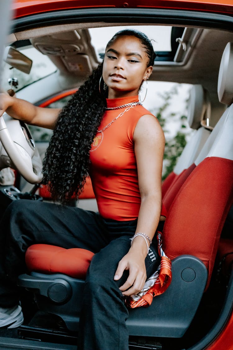 Woman Sitting In A Car 