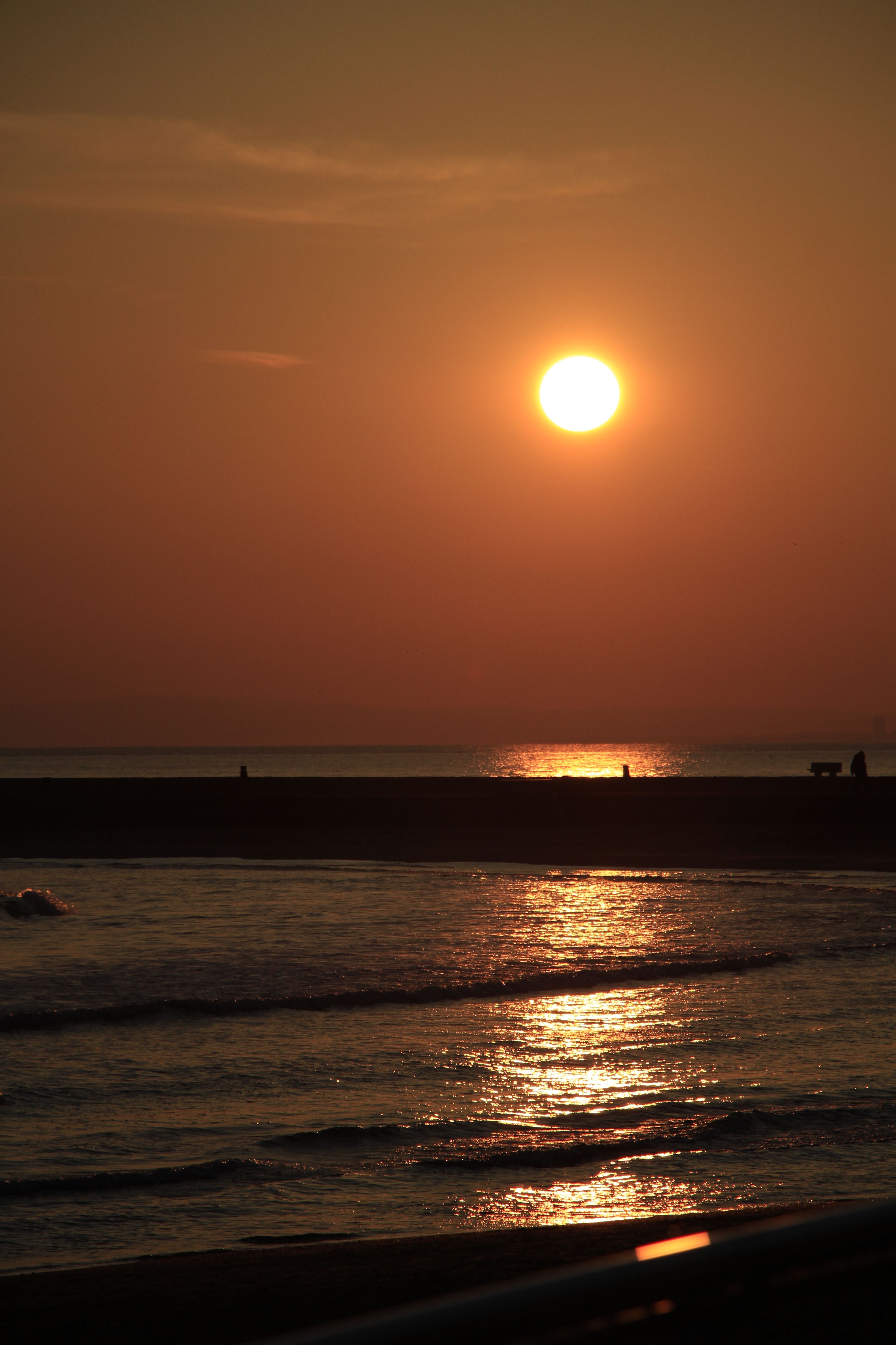 Sun on Yellow Sky over Sea Shore · Free Stock Photo