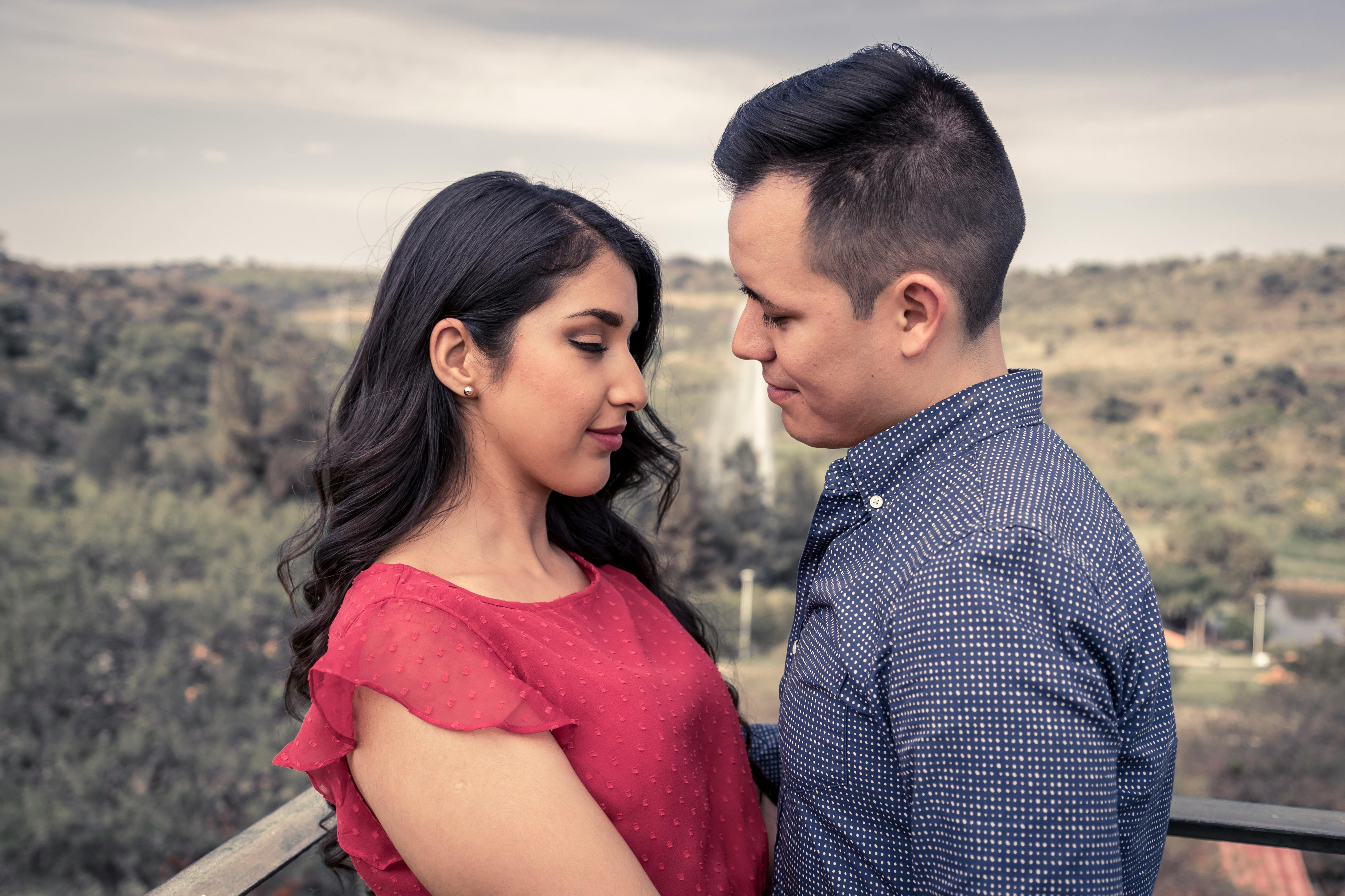 Portrait Of Young Beautiful Couple Standing Close Together, Girl With Her  Head On His Shoulder, Smiling Looking At Camera Stock Photo, Picture and  Royalty Free Image. Image 152949263.