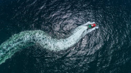 Top View Photo of Boat on Ocean