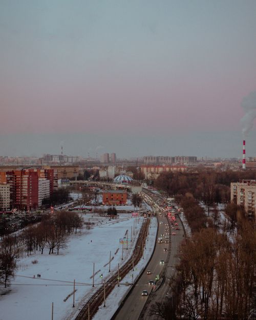 Free Aerial cityscape of Saint Petersburg showcasing snowy streets and urban architecture at twilight. Stock Photo