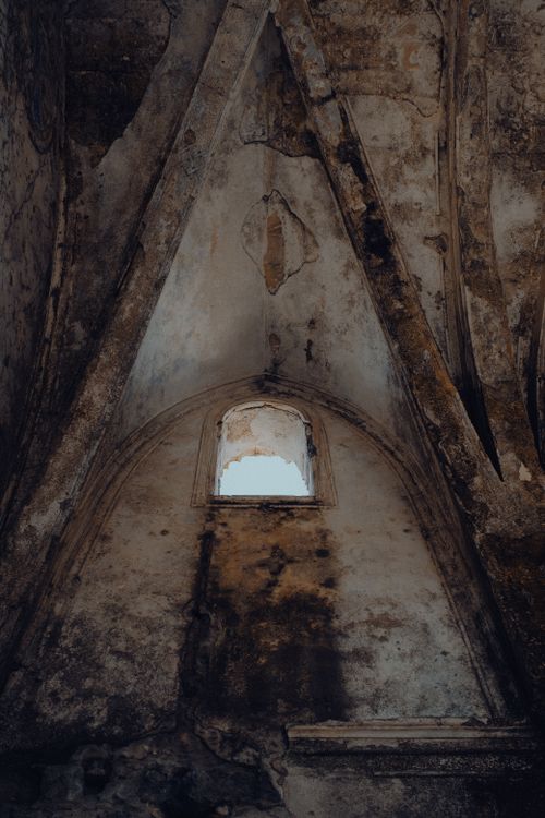 Free Explore the mysterious beauty of an abandoned interior with a unique arched architecture. Stock Photo