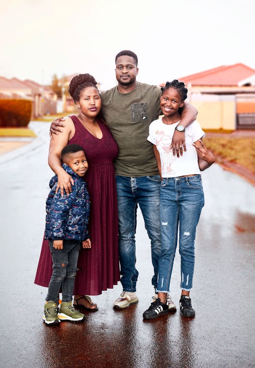 Family Standing on a Road 