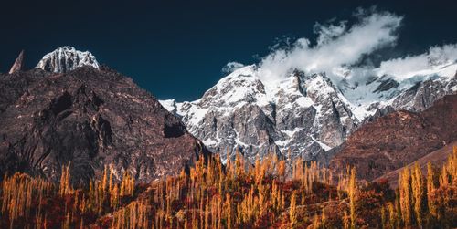 Free Stunning autumn landscape of scenic snowy mountains in the Hunza Valley, offering a breathtaking view. Stock Photo