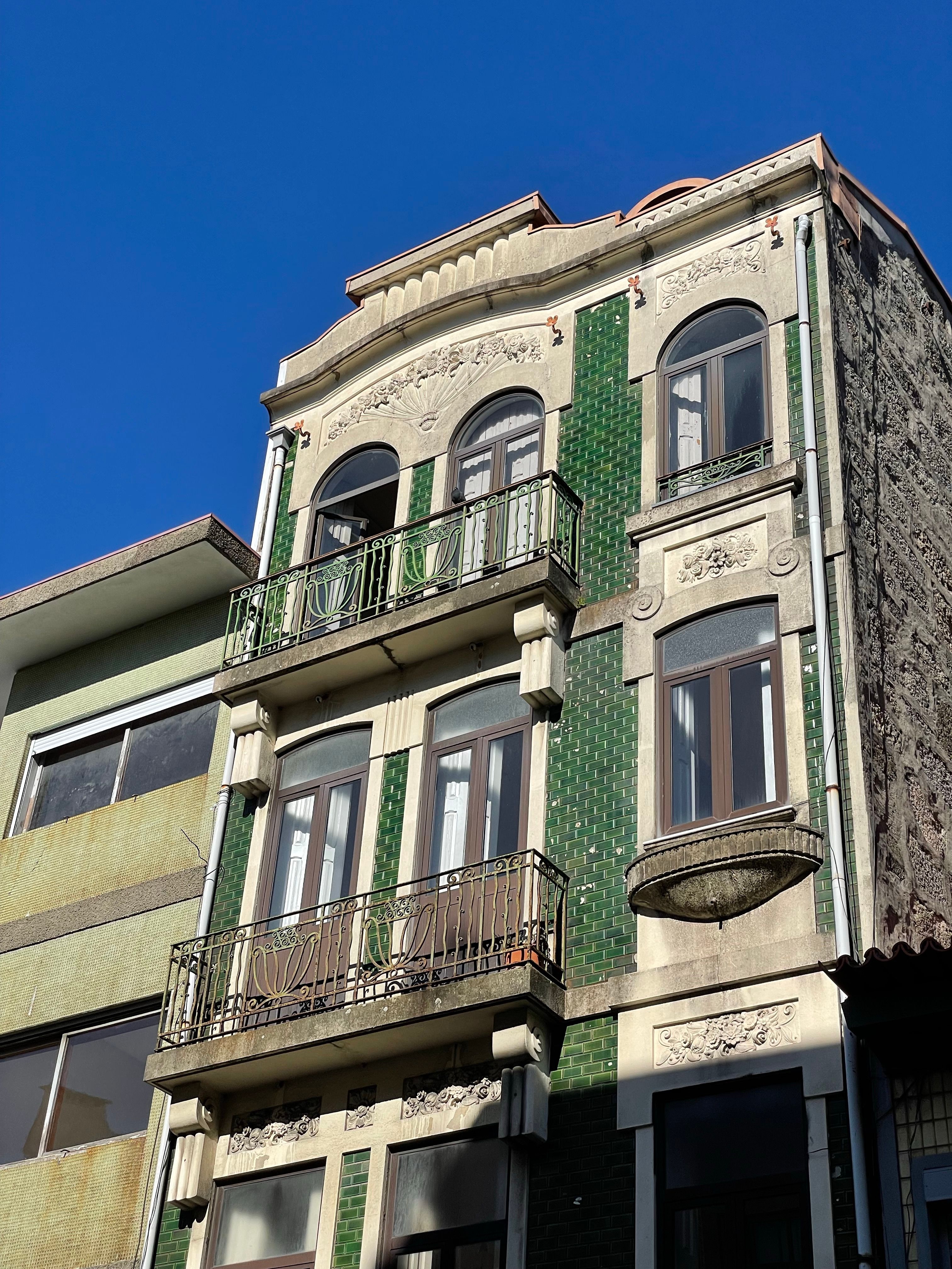 Windows of Colorful Residential Building · Free Stock Photo
