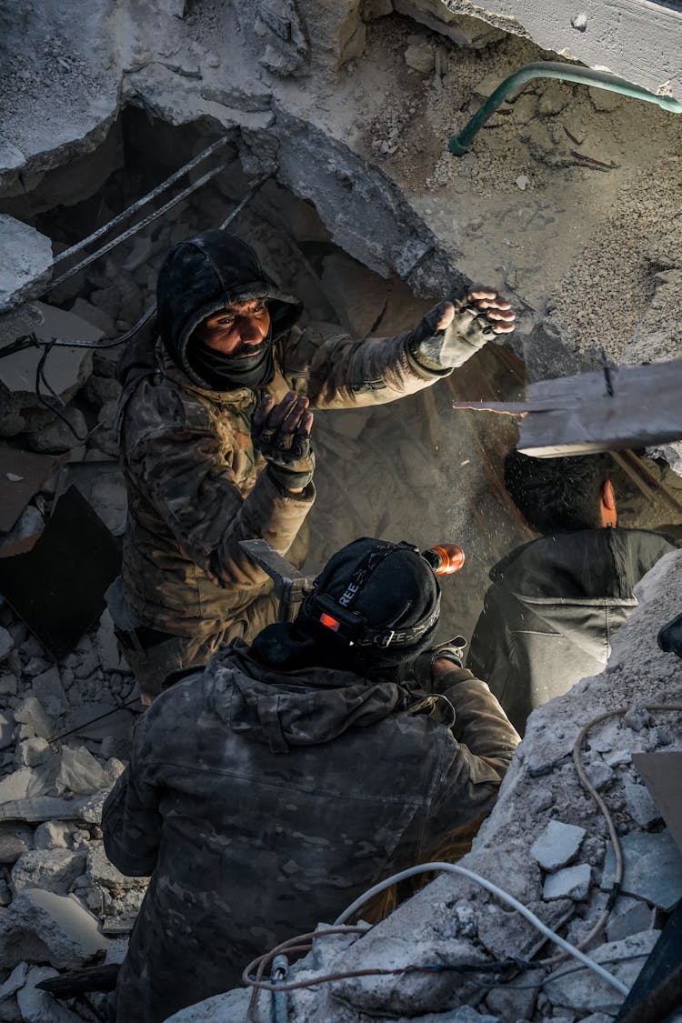 Photo Of Soldiers Amid Debris 