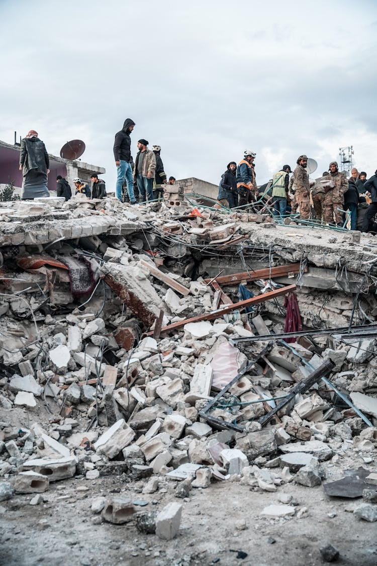 People In A Destroyed City 