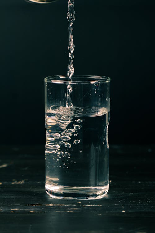 Free Clear Liquid in Drinking Glass Stock Photo