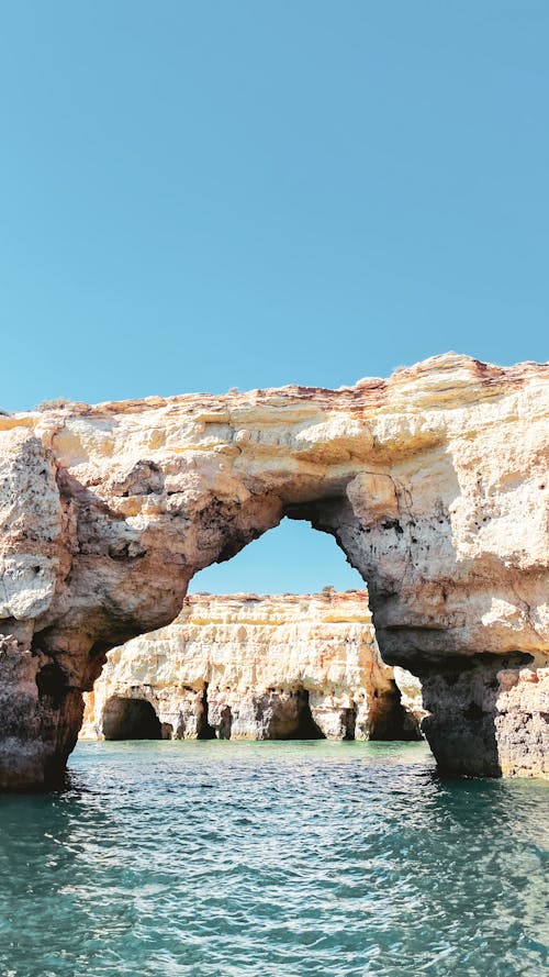 Arch and Rock Formations on Sea Shore