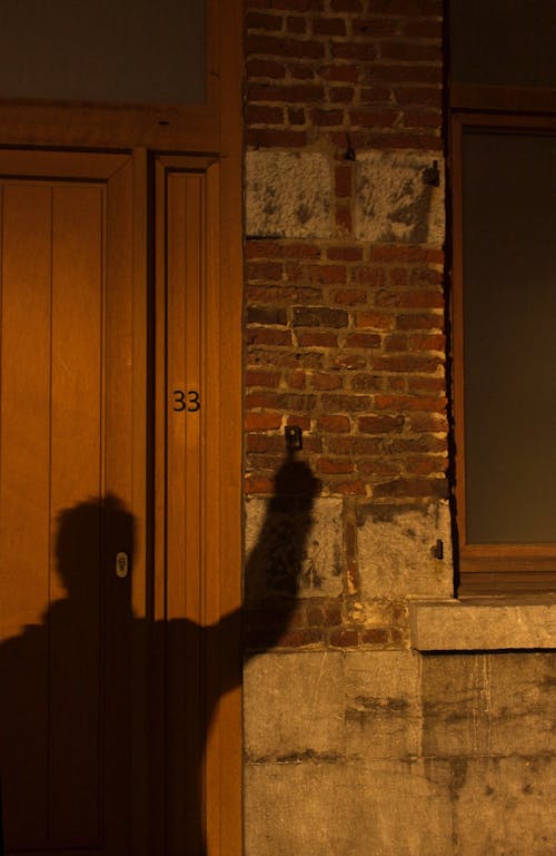 Shadow of a Man on the Building Exterior 