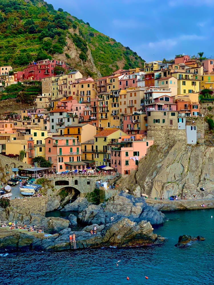 View Of Houses On The Coast In Manarola, Cinque Terre, Italy 