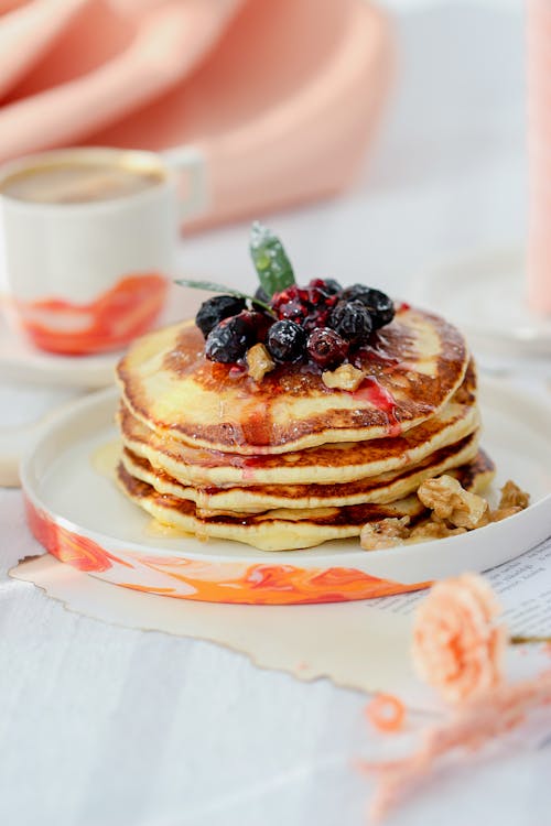 Free Pancakes with Berries and Marple Syrup  Stock Photo