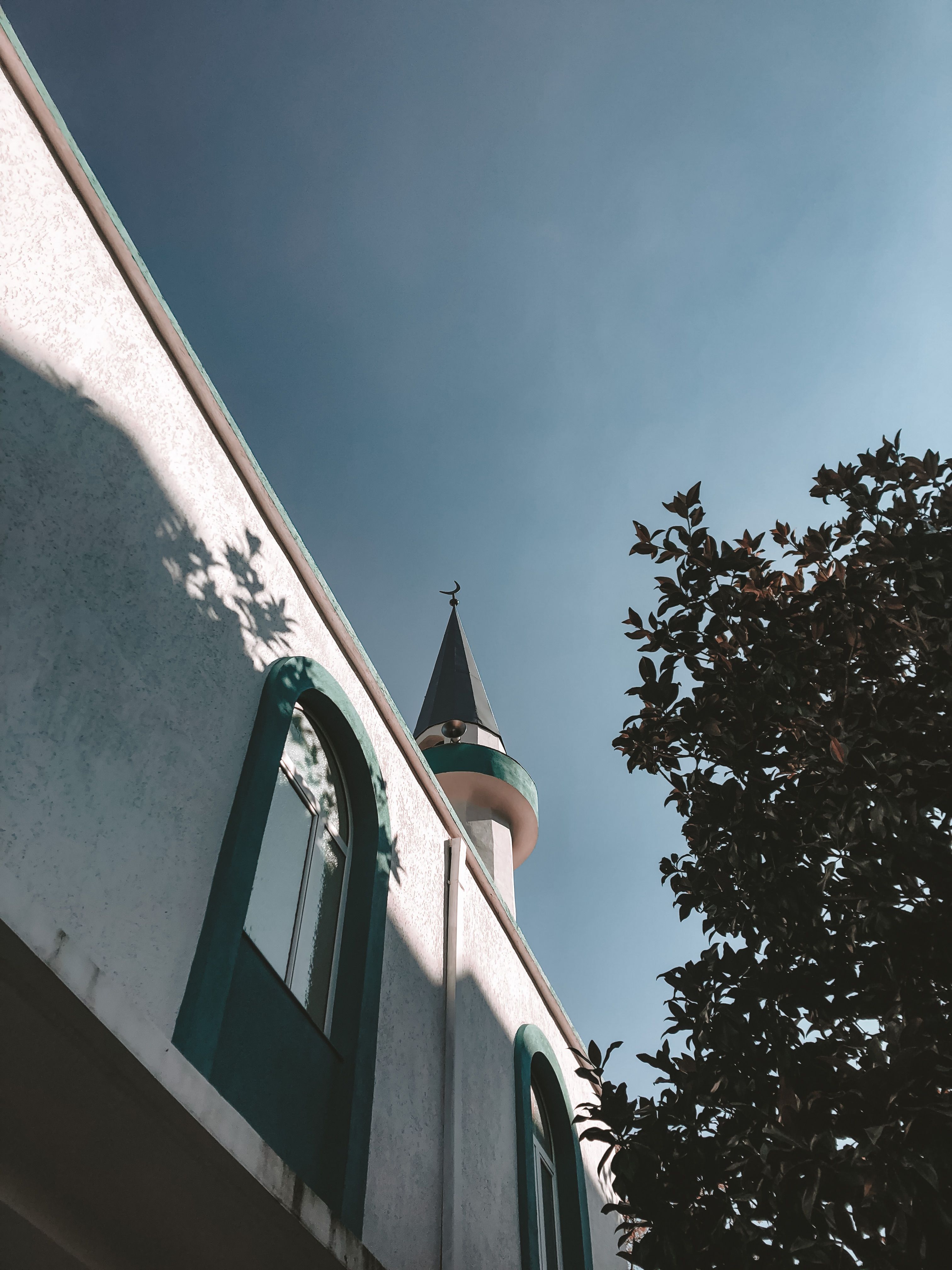 Shadow Cast on Wall of Church · Free Stock Photo