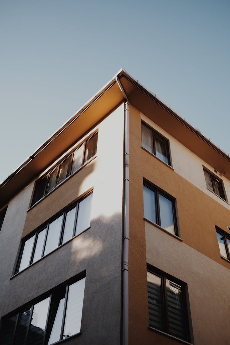 Apartment Building On Blue Sky Background