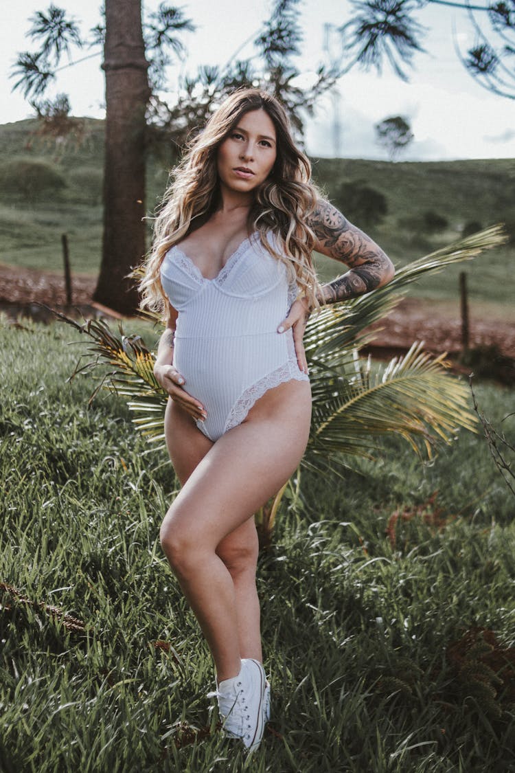 Pregnant Woman Posing Outdoors 