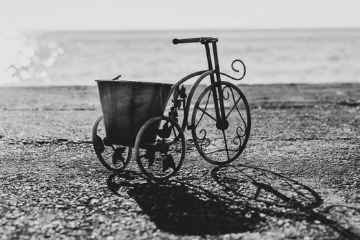 A decorative bicycle with three wheels