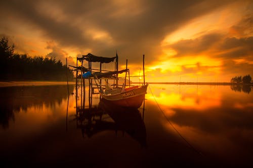 Sunset over Moored Boat