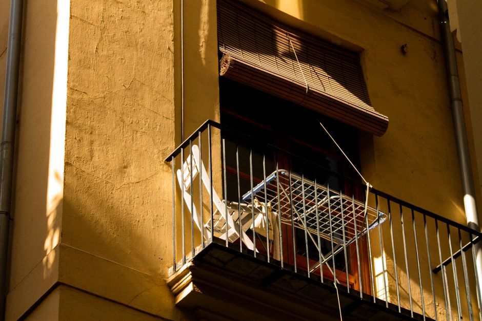 5 Essential Considerations for Choosing the Perfect Wall Rack for Balcony - A Guide to Maximize Space in Tiny Apartments Wall rack for balcony with compact storage and minimalist design