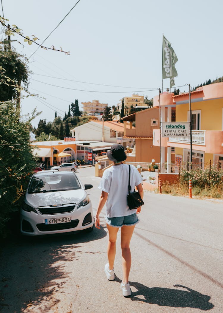 Woman Walking On City Street