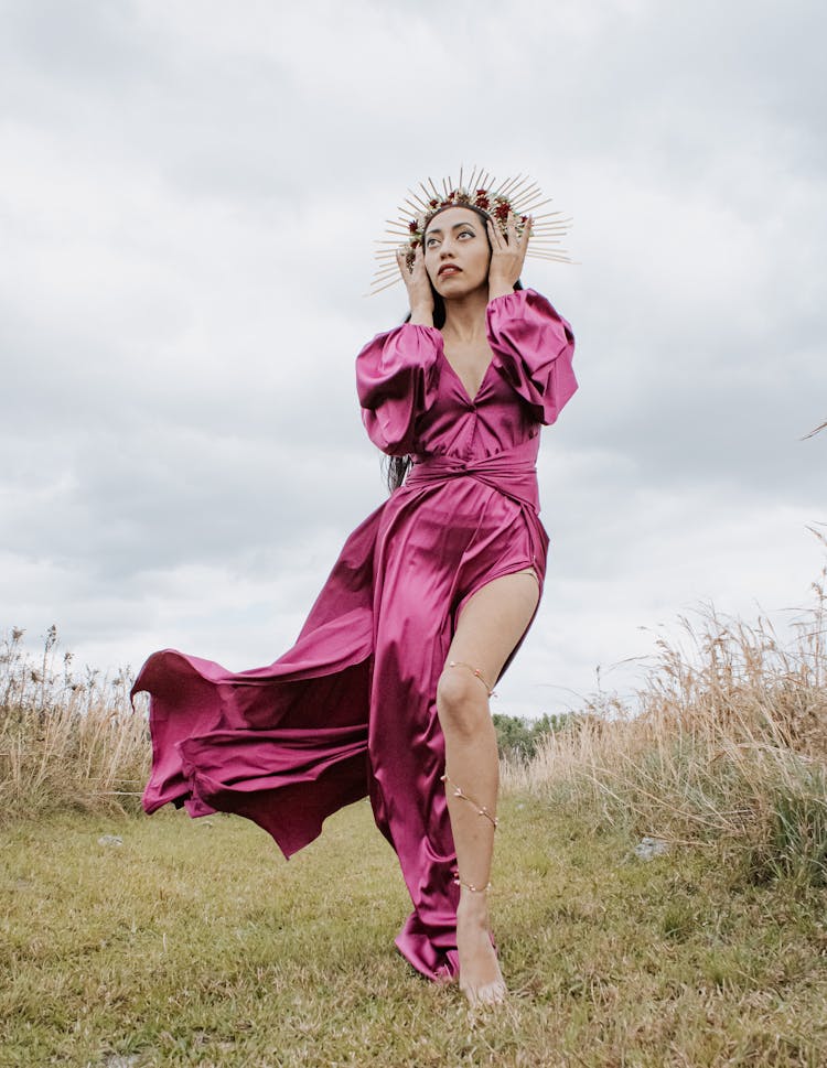 Woman Posing In Pink Dress And Wreath