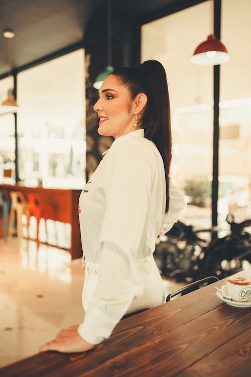 Woman Posing in White Clothes