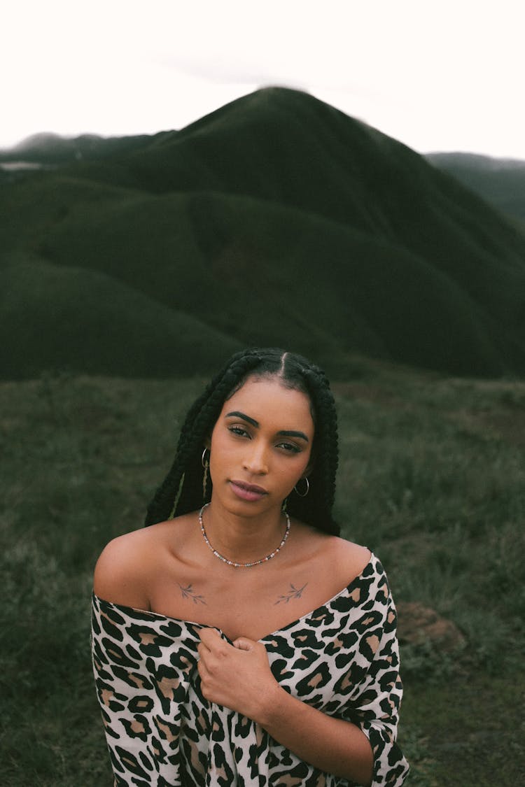 Beautiful Woman With Necklace On Hill