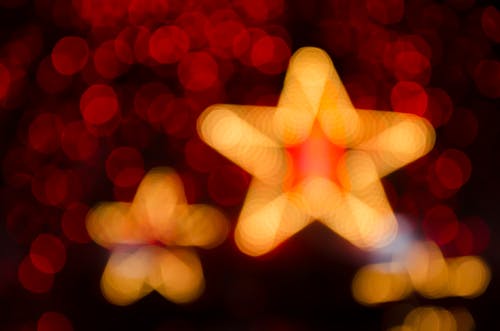 Ücretsiz Turuncu Yıldız Bokeh Işık Stok Fotoğraflar