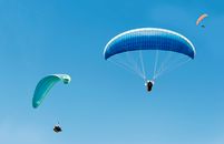 People Riding Para Gliders