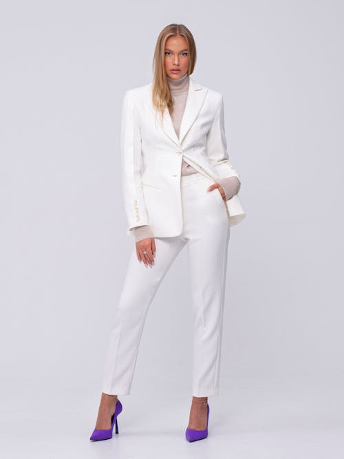 Woman Wearing a White Suit 