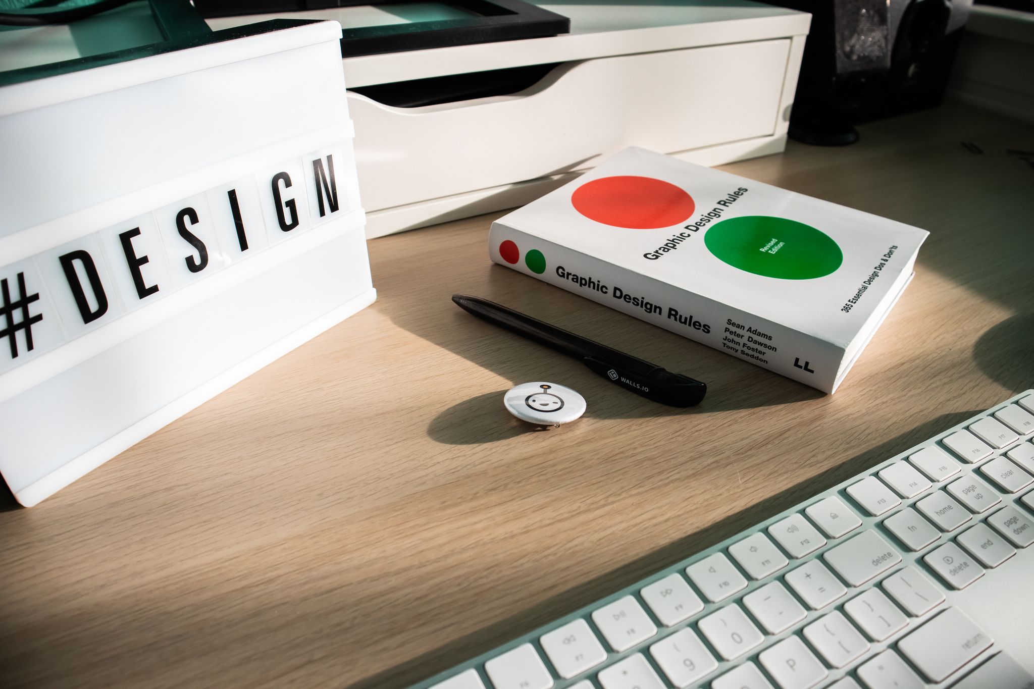 Graphic designer working at a desk