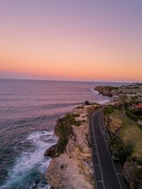 Cliff road above the sea, photo by Mudassir Ali on Pexels