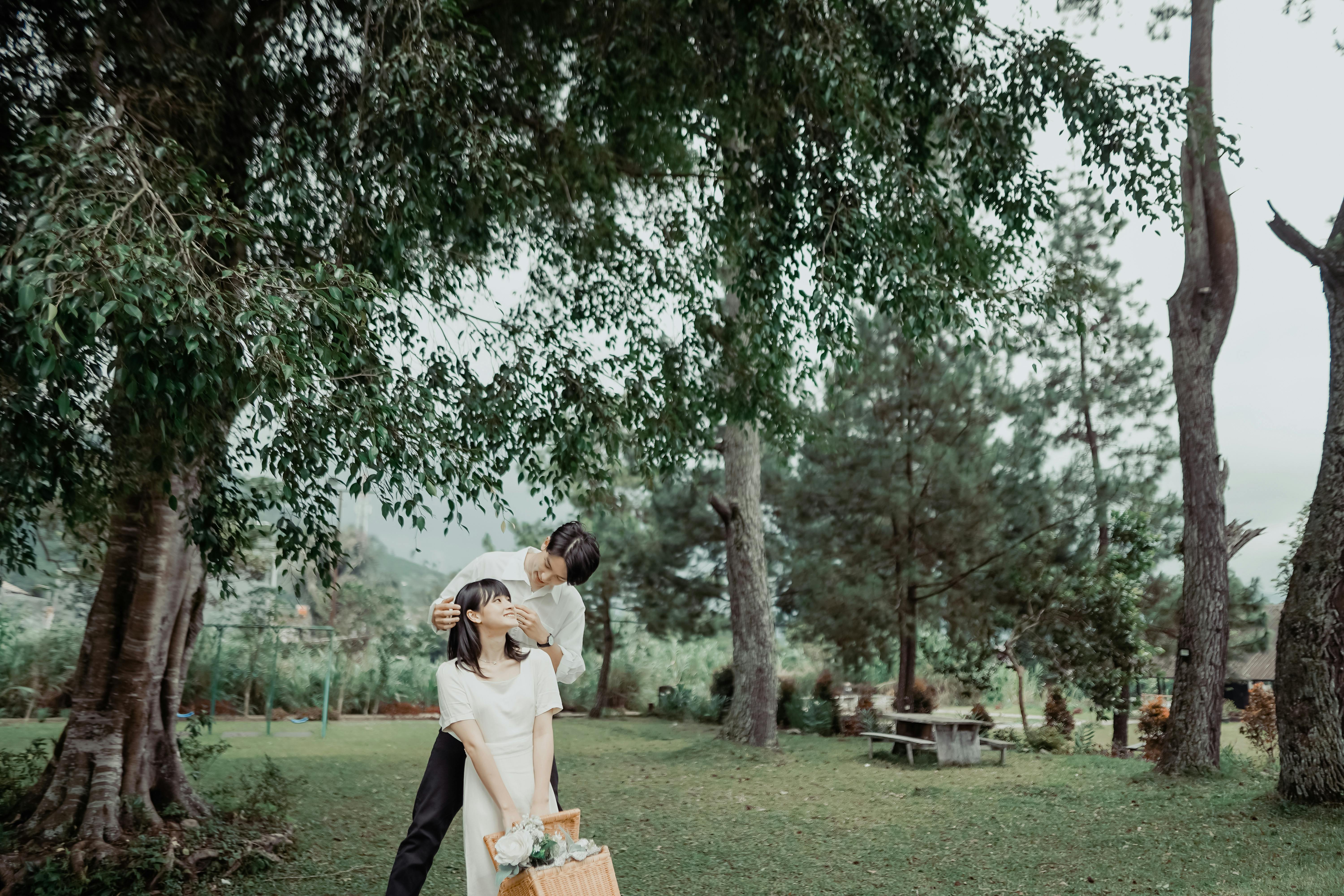 A couple enjoying a simple picnic in a scenic park - weekend getaways near me