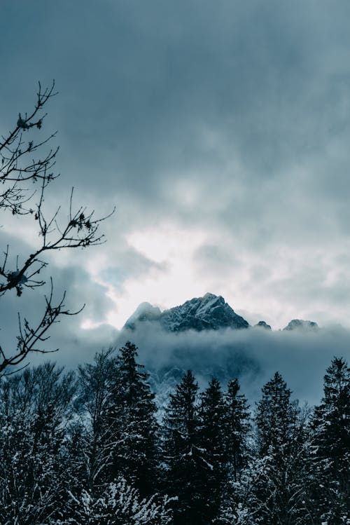 Mountain Covered in Clouds in Winter 