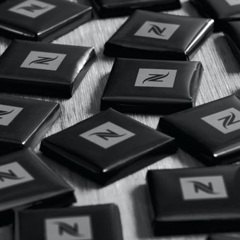 Wrapped chocolate squares, photo by Nicolae Anghelenici on Pexels