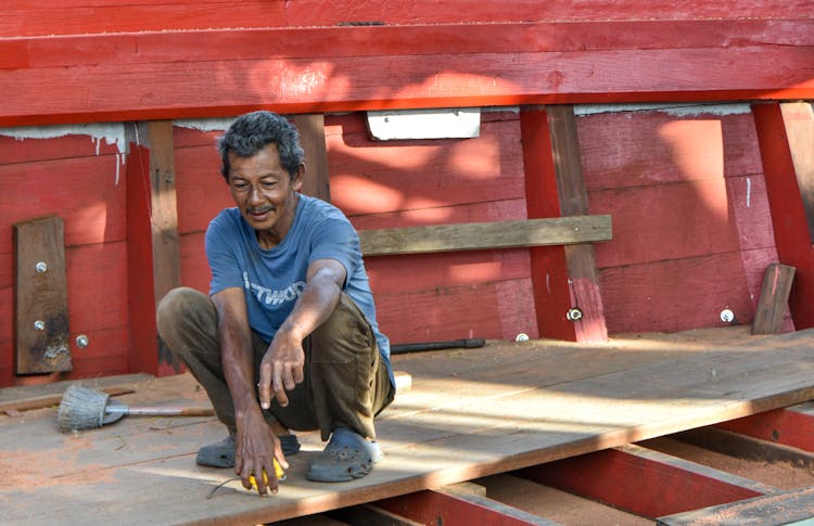 Man Building A Boat Deck