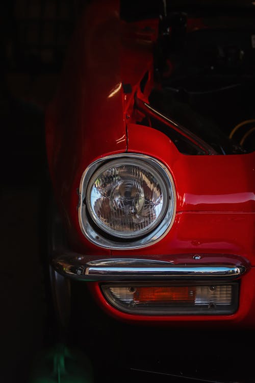 Headlight of Vintage Red Car