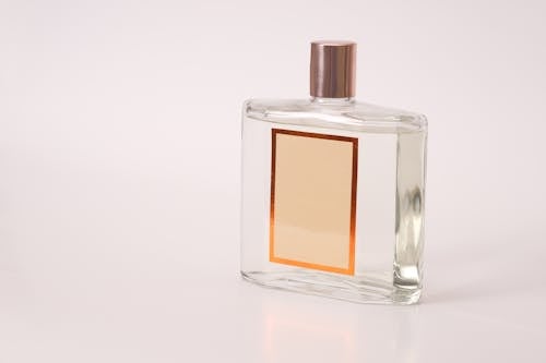 A Perfume Bottle with an Empty Label 